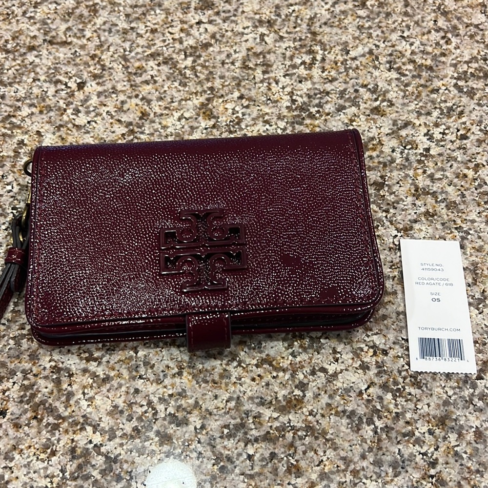 Tory Burch burgundy wristlet
